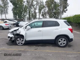 2020 Chevrolet Trax LT with VIN KL7CJLSB7LB008290, listed as a IAAI auction lot 42030672 with 50,739 mi miles. Bid and sale history available at carsss.com. Image 14.