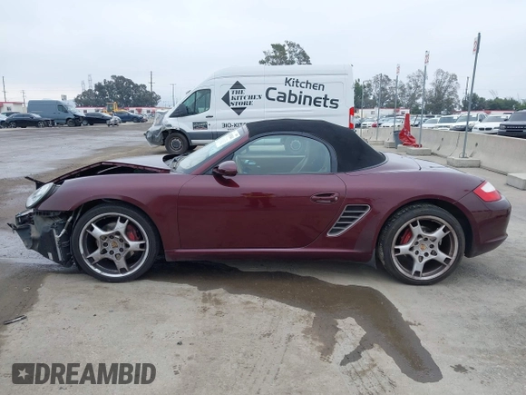 2005 Porsche Boxster S z VIN WP0CB29865U731351, wystawiony jako IAAI lot #42153541 z przebiegiem 97 378 mil mil oraz . Historia ofert i sprzedaży dostępna na DreamBid. Obrazek 14.