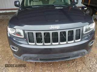 2014 Jeep Grand Cherokee Laredo with VIN 1C4RJEAG6EC206748, listed as a IAAI auction lot 42244421 with 198,217 mi miles and . Bid and sale history available at DreamBid. Image 6.