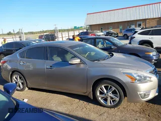 2014 Nissan Altima 2.5 with VIN 1N4AL3AP8EN369973, listed as a IAAI auction lot 40566240 with 145,434 mi miles. Bid and sale history available at carsss.com. Image 13.