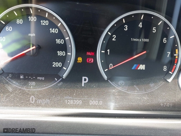 2013 BMW M5 with VIN WBSFV9C58DC773268, listed as a IAAI auction lot 41890830 with 128,399 mi miles. Bid and sale history available at carsss.com. Image 7.