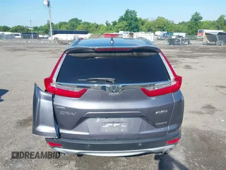 2018 Honda CR-V Touring z VIN 5J6RW2H93JL004834, wystawiony jako IAAI lot #42351364 z przebiegiem 63 746 mil mil oraz . Historia ofert i sprzedaży dostępna na DreamBid. Obrazek 16.