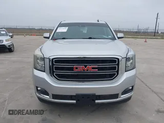 2015 GMC Yukon SLT with VIN 1GKS1BKC3FR253184, listed as a IAAI auction lot 41574610 with 152,543 mi miles. Bid and sale history available at carsss.com. Image 12.