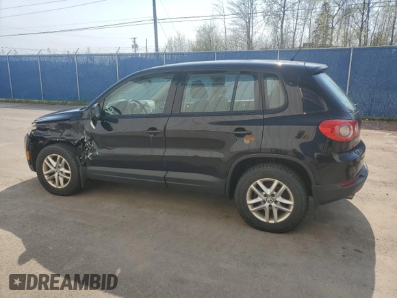 2011 Volkswagen Tiguan with VIN WVGCV7AX8BW511387, listed as a Copart auction lot 57284625 with 284,102 mi miles and Salvage title. Bid and sale history available at DreamBid. Image 2.