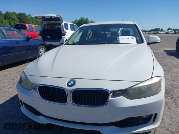 2014 BMW 3 Series 328i with VIN WBA3A5C58EF605108, listed as a IAAI auction lot 42129770 with 169,924 mi miles and . Bid and sale history available at DreamBid. Image 12.