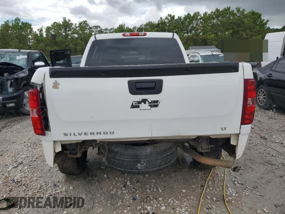 2013 Chevrolet Silverado 1500 LT with VIN 3GCPCSEA8DG237890, listed as a Copart auction lot 64668184 with 196,804 mi miles and Salvage Title. Bid and sale history available at DreamBid. Image 6.
