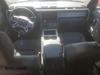 2025 Land Rover Defender S with VIN SALEJ7EXXS2358756, listed as a Copart auction lot 58084165 with 10,919 mi miles and Salvage title. Bid and sale history available at DreamBid. Image 8.