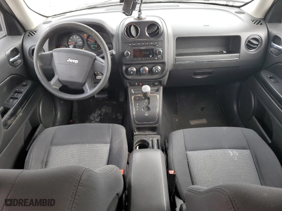 2010 Jeep Patriot Sport with VIN 1J4NT2GA8AD593957, listed as a Copart auction lot 89382615 with 145,185 mi miles and Salvage Title. Bid and sale history available at carsss.com. Image 8.