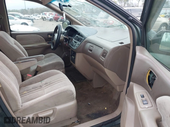 2000 Toyota Sienna CE with VIN 4T3ZF19C7YU240601, listed as a IAAI auction lot 41709617 with 999,999 mi miles. Bid and sale history available at carsss.com. Image 5.