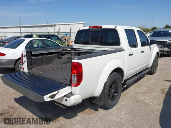 2021 Nissan Frontier SV z VIN 1N6ED0EA4MN704865, wystawiony jako IAAI lot #41990731 z przebiegiem 13 329 mil mil oraz . Historia ofert i sprzedaży dostępna na DreamBid. Obrazek 4.