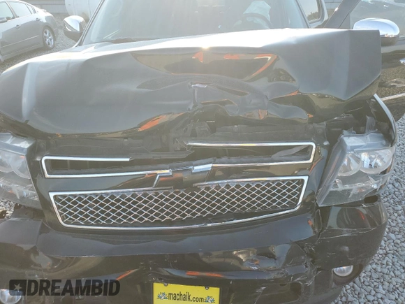 2014 Chevrolet Tahoe LTZ z VIN 1GNSCCE0XER103558, wystawiony jako Copart lot #67590424 z przebiegiem Nie podano mil oraz Szkoda całkowita • Salvage title. Historia ofert i sprzedaży dostępna na DreamBid. Obrazek 13.