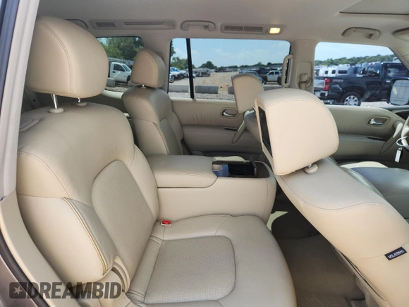 2016 Infiniti QX80 with VIN JN8AZ2NE2G9123772, listed as a Copart auction lot 63665105 with 98,304 mi miles and Salvage title. Bid and sale history available at DreamBid. Image 11.