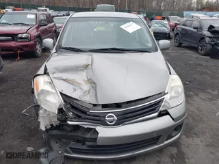 2012 Nissan Versa S with VIN 3N1BC1CP0CK225212, listed as a IAAI auction lot 42046177 with 191,423 mi miles. Bid and sale history available at carsss.com. Image 12.