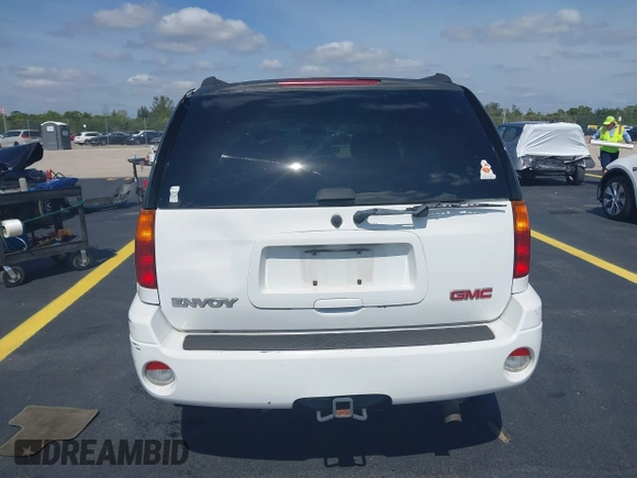 2003 GMC Envoy SLT z VIN 1GKDS13S532221928, wystawiony jako IAAI lot #42211340 z przebiegiem 149 902 mil mil oraz . Historia ofert i sprzedaży dostępna na DreamBid. Obrazek 16.