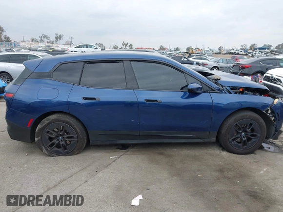 2024 BMW iX xDrive50 z VIN WB523CF05RCN71984, wystawiony jako IAAI lot #41469238 z przebiegiem 45 447 mil mil oraz . Historia ofert i sprzedaży dostępna na DreamBid. Obrazek 13.