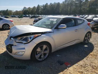 2016 Hyundai Veloster z VIN KMHTC6AD5GU256688, wystawiony jako Copart lot #48726675 z przebiegiem 139 747 mil mil oraz Szkody całkowita. Historia ofert i sprzedaży dostępna na DreamBid. Obrazek 1.
