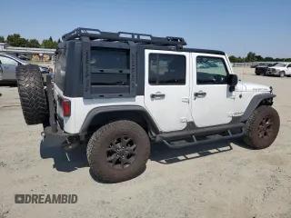 2014 Jeep Wrangler Unlimited Rubicon with VIN 1C4BJWFG0EL201559, listed as a Copart auction lot 59580575 with 182,101 mi miles and Salvage title. Bid and sale history available at DreamBid. Image 3.