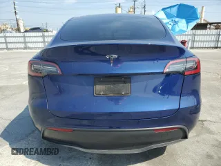 2024 Tesla Model Y with VIN 7SAYGDED0RF102479, listed as a Copart auction lot 55431975 with 23,989 mi miles and Salvage title. Bid and sale history available at DreamBid. Image 6.