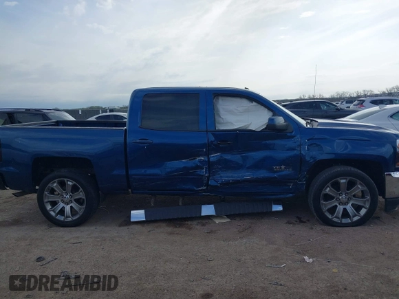 2018 Chevrolet Silverado 1500 LT with VIN 3GCPCREH1JG125997, listed as a IAAI auction lot 41884888 with 122,406 mi miles and . Bid and sale history available at DreamBid. Image 13.
