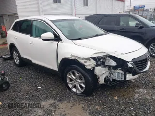 2015 Mazda CX-9 Touring with VIN JM3TB2CA1F0449033, listed as a IAAI auction lot 41549205 with 95,106 mi miles. Bid and sale history available at carsss.com. Image 1.