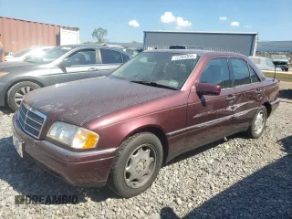 1997 Mercedes-Benz C with VIN WDBHA23E5VF518305, listed as a Copart auction lot 72264304 with 200,639 mi miles and Salvage title. Bid and sale history available at DreamBid. Image 1.