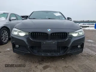 2018 BMW 3 Series 330i xDrive with VIN WBA8D9C59JA012658, listed as a IAAI auction lot 41523677 with 117,049 mi miles and . Bid and sale history available at DreamBid. Image 6.