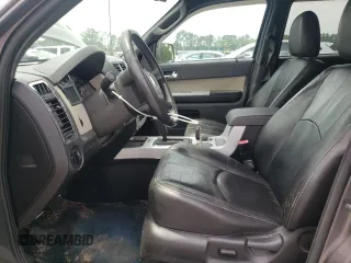 2011 Mercury Mariner Premier z VIN 4M2CN8HG8BKJ07653, wystawiony jako Copart lot #57495725 z przebiegiem 105 624 mil mil oraz Szkoda całkowita • Salvage title. Historia ofert i sprzedaży dostępna na DreamBid. Obrazek 7.