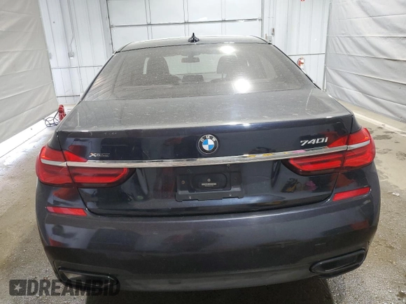 2019 BMW 7 Series 740i xDrive with VIN WBA7E4C58KGV70026, listed as a Copart auction lot 59465615 with Not provided miles and Salvage title. Bid and sale history available at DreamBid. Image 6.