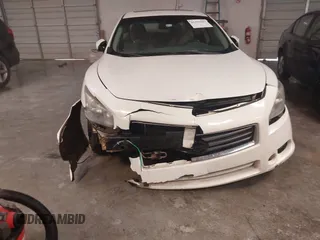 2014 Nissan Maxima SV z VIN 1N4AA5APXEC478724, wystawiony jako IAAI lot #41335407 z przebiegiem 161 985 mil mil oraz . Historia ofert i sprzedaży dostępna na DreamBid. Obrazek 6.