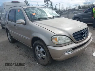2004 Mercedes-Benz M 3.5L with VIN 4JGAB57E34A490460, listed as a IAAI auction lot 41890766 with 132,043 mi miles. Bid and sale history available at carsss.com. Image 1.