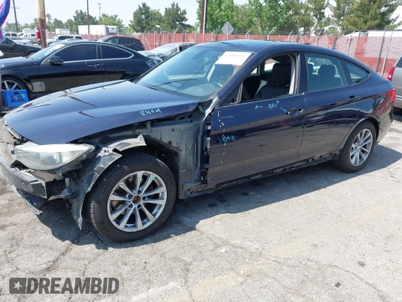 2014 BMW 3 Series 328i Gran Turismo xDrive z VIN WBA3X5C50ED557470, wystawiony jako IAAI lot #42606682 z przebiegiem 172 016 mil mil oraz . Historia ofert i sprzedaży dostępna na DreamBid. Obrazek 22.
