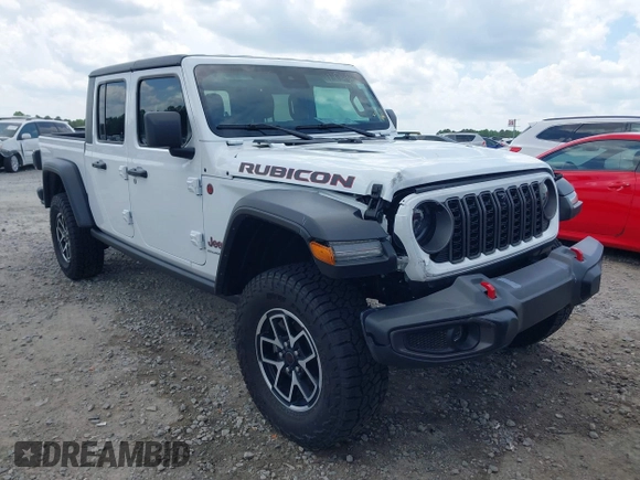 2024 Jeep Gladiator Rubicon z VIN 1C6JJTBG5RL110865, wystawiony jako IAAI lot #42104829 z przebiegiem 6 815 mil mil oraz . Historia ofert i sprzedaży dostępna na DreamBid. Obrazek 1.