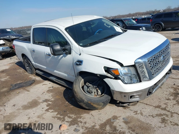 2017 Nissan Titan SL with VIN 1N6AA1E64HN565318, listed as a IAAI auction lot 41322120 with 114,515 mi miles and . Bid and sale history available at DreamBid. Image 1.