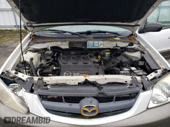 2001 Mazda Tribute LX with VIN 4F2CU08101KM11452, listed as a Copart auction lot 76796064 with 175,584 mi miles and Salvage Title. Bid and sale history available at DreamBid. Image 12.