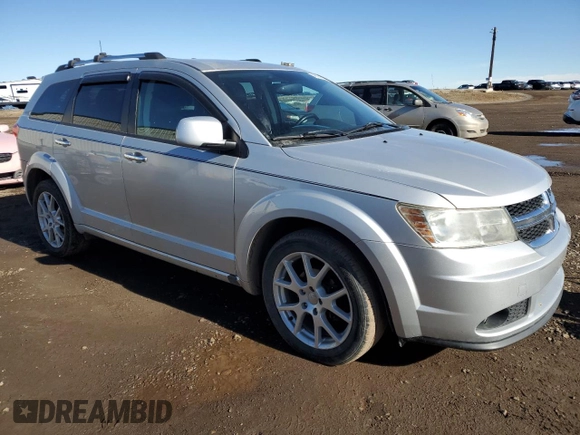 2012 Dodge Journey SXT with VIN 3C4PDCCG7CT135822, listed as a Copart auction lot 48820205 with 253,183 mi miles and Clean title. Bid and sale history available at DreamBid. Image 4.