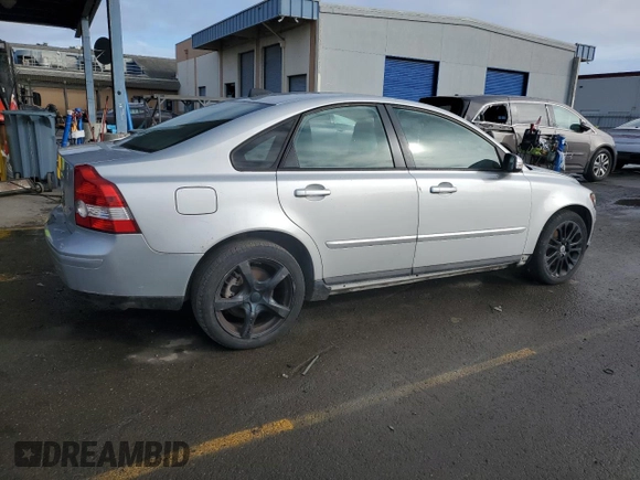 2007 Volvo S40 2.4L z VIN YV1MS390972275519, wystawiony jako Copart lot #86431954 z przebiegiem 227 441 mil mil oraz Szkoda całkowita • Salvage title. Historia ofert i sprzedaży dostępna na DreamBid. Obrazek 3.