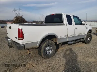 1998 Ford F-250 with VIN 1FTPX28L4WKA41149, listed as a Copart auction lot 84369654 with 430,187 mi miles and Salvage title. Bid and sale history available at DreamBid. Image 3.