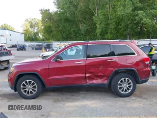 2014 Jeep Grand Cherokee Limited with VIN 1C4RJFBG8EC553860, listed as a IAAI auction lot 42452419 with 174,274 mi miles and . Bid and sale history available at DreamBid. Image 14.