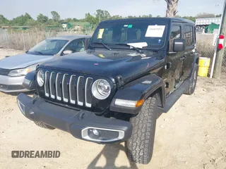 2021 Jeep Wrangler Unlimited Sahara with VIN 1C4HJXEG3MW536507, listed as a IAAI auction lot 41601893 with 51,214 mi miles and . Bid and sale history available at DreamBid. Image 2.