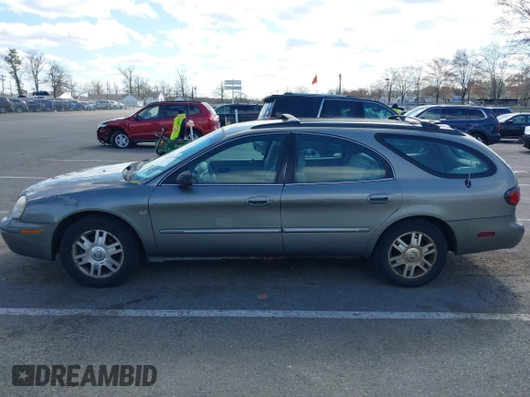 2004 Mercury Sable LS Premium z VIN 1MEFM59S74A609472, wystawiony jako IAAI lot #41971270 z przebiegiem 181 289 mil mil oraz . Historia ofert i sprzedaży dostępna na DreamBid. Obrazek 14.