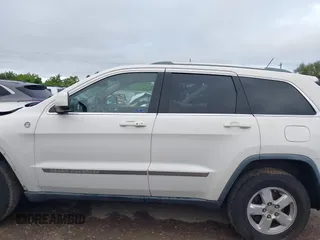 2012 Jeep Grand Cherokee Laredo with VIN 1C4RJFAG5CC224032, listed as a IAAI auction lot 42069334 with 106,614 mi miles. Bid and sale history available at carsss.com. Image 15.