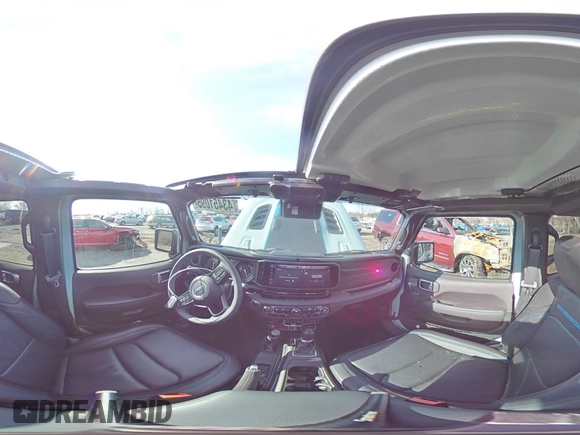 2024 Jeep Wrangler Rubicon with VIN 1C4RJXR61RW255979, listed as a Copart auction lot 43451095 with 7,258 mi miles and Salvage title. Bid and sale history available at DreamBid. Image 14.