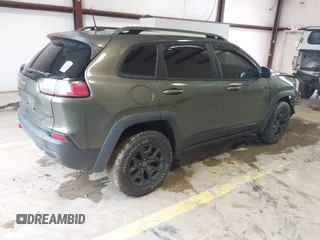 2020 Jeep Cherokee Trailhawk Elite with VIN 1C4PJMBN2LD538076, listed as a IAAI auction lot 42219282 with 53,773 mi miles and . Bid and sale history available at DreamBid. Image 4.