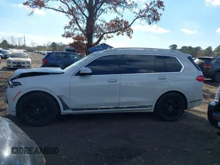 2019 BMW X7 xDrive50i z VIN 5UXCX4C59KLS38761, wystawiony jako IAAI lot #40743791 z przebiegiem Nie podano mil oraz . Historia ofert i sprzedaży dostępna na DreamBid. Obrazek 13.