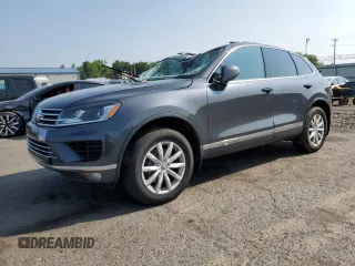 2015 Volkswagen Touareg Lux with VIN WVGEP9BP6FD003059, listed as a Copart auction lot 59670505 with 162,945 mi miles and Salvage title. Bid and sale history available at DreamBid. Image 1.