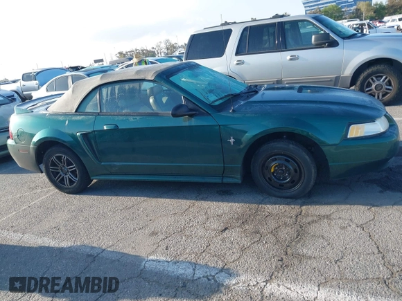 2000 Ford Mustang with VIN 1FAFP444XYF207441, listed as a IAAI auction lot 42120700 with 119,335 mi miles. Bid and sale history available at carsss.com. Image 13.