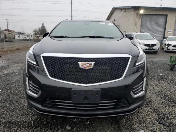 2020 Cadillac XT5 Sport AWD with VIN 1GYKNGRS5LZ232546, listed as a Copart auction lot 84104644 with 25,276 mi miles and Salvage title. Bid and sale history available at DreamBid. Image 5.
