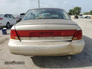 1998 Saturn SL with VIN 1G8ZK5270WZ240303, listed as a Copart auction lot 65364164 with 156,699 mi miles and Salvage title. Bid and sale history available at DreamBid. Image 6.