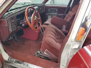 1991 Cadillac Brougham z VIN 1G6DW5474MR703030, wystawiony jako Copart lot #64687894 z przebiegiem 161 866 mil mil oraz Szkody całkowita. Historia ofert i sprzedaży dostępna na DreamBid. Obrazek 7.