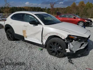 2023 Mazda CX-30 Premium with VIN 3MVDMBDY1PM510574, listed as a Copart auction lot 78449424 with 75,631 mi miles and Salvage title. Bid and sale history available at DreamBid. Image 4.